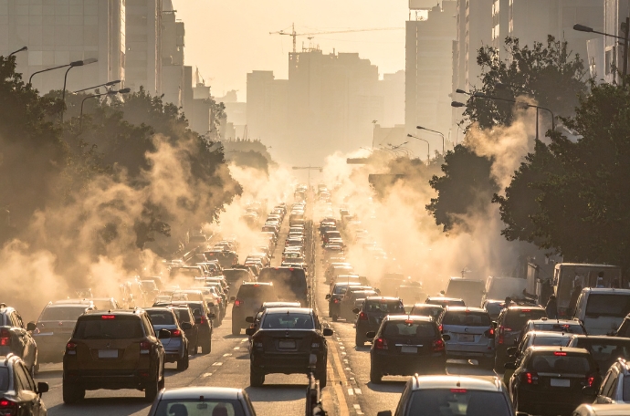 Car pollution on a busy road
